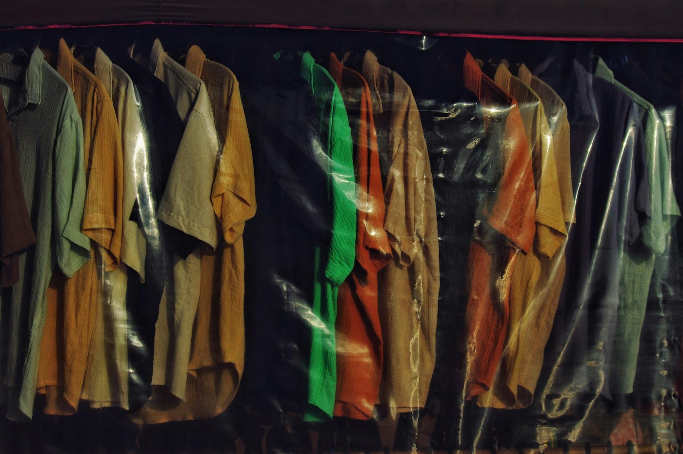 Shirts hanging on a clothing rack